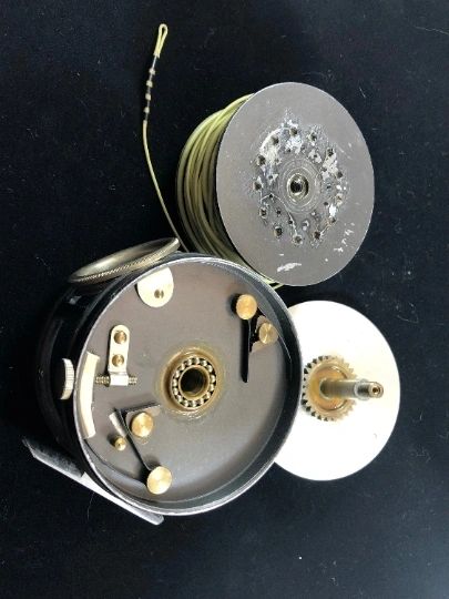 Hardy Perfect antique Salmon fly fishing reel detail against a